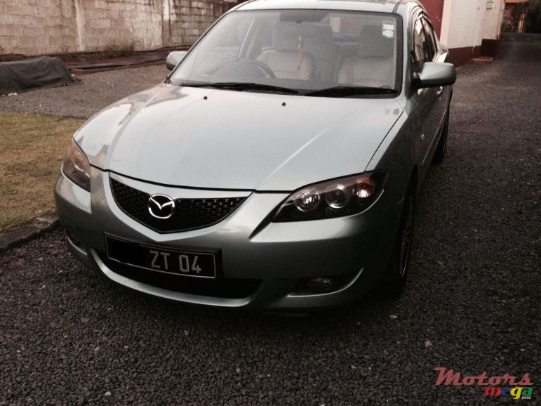 2004' Mazda 3 photo #1
