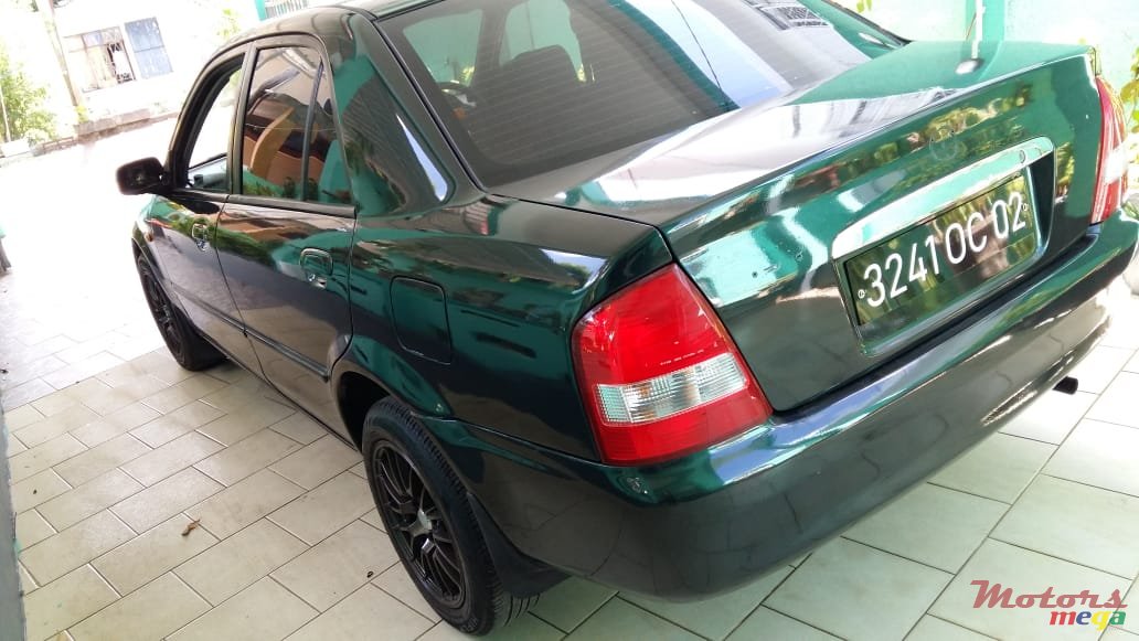 2002' Mazda 323 photo #6