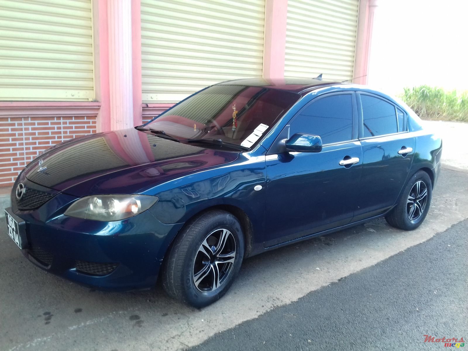 2004' Mazda 3 photo #1