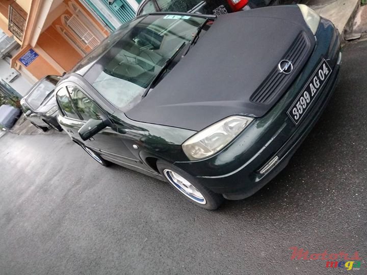 2004' Opel Astra jant cosmic,CD player photo #2