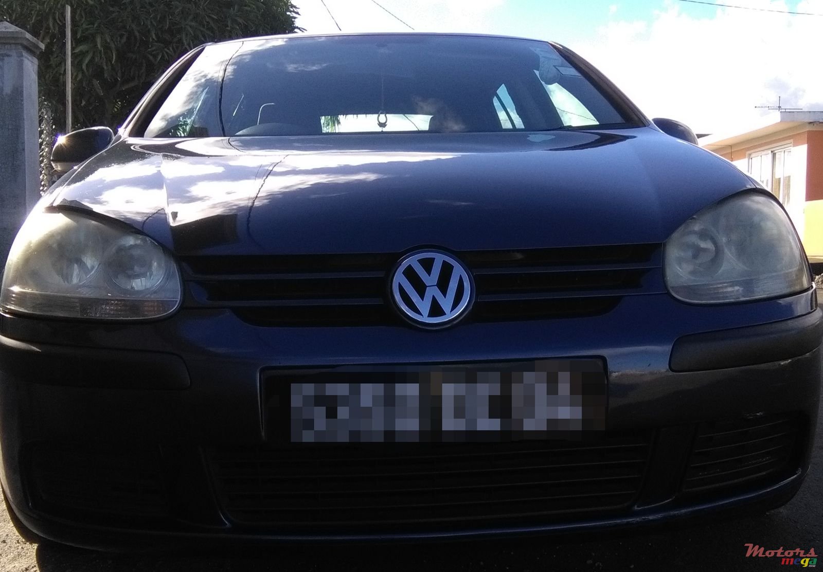 2004' Volkswagen Golf V photo #2