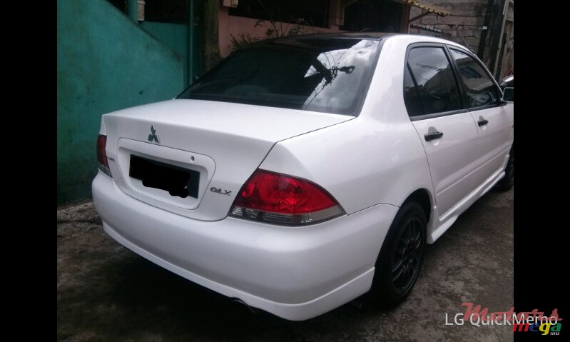 2004' Mitsubishi Lancer photo #1