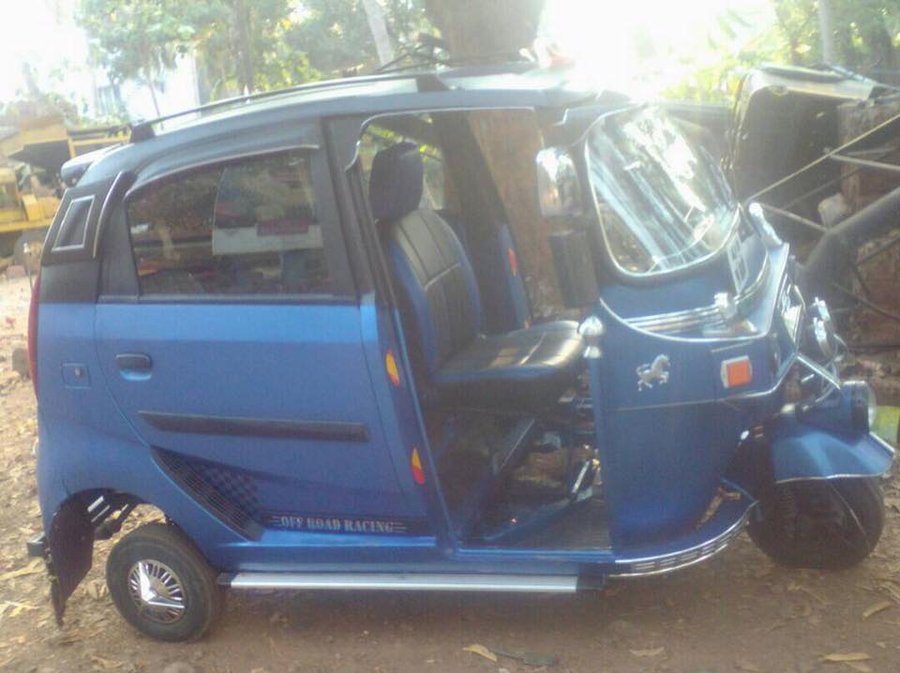 3-wheeled Auto Rickshaw modded with Tata Nano doors