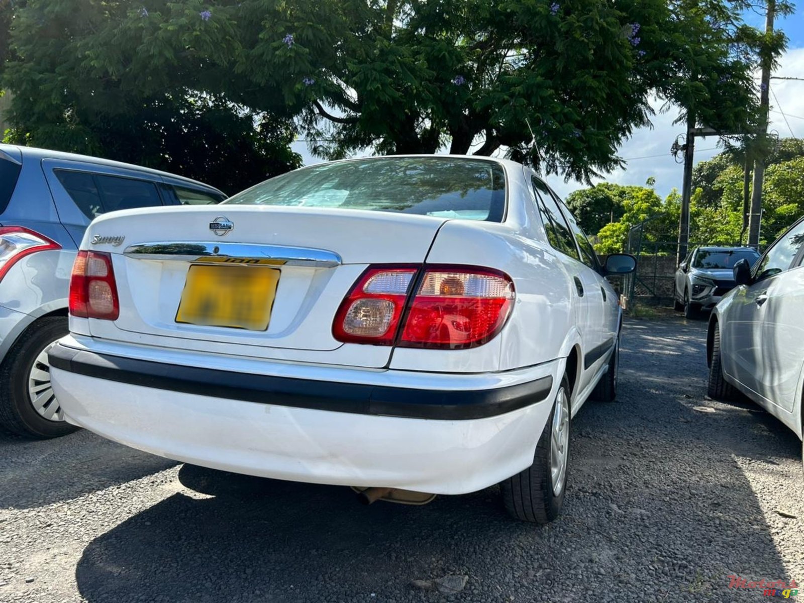 2002' Nissan Sunny photo #1