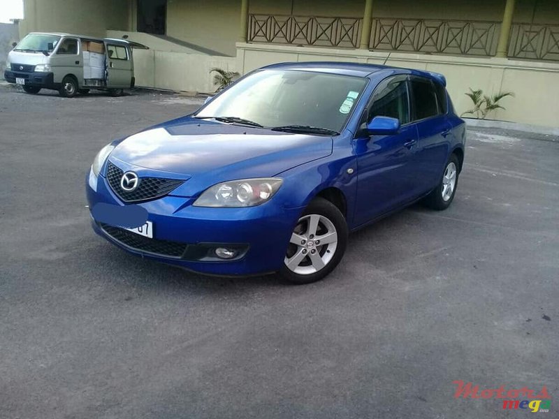 2007' Mazda 3 photo #1