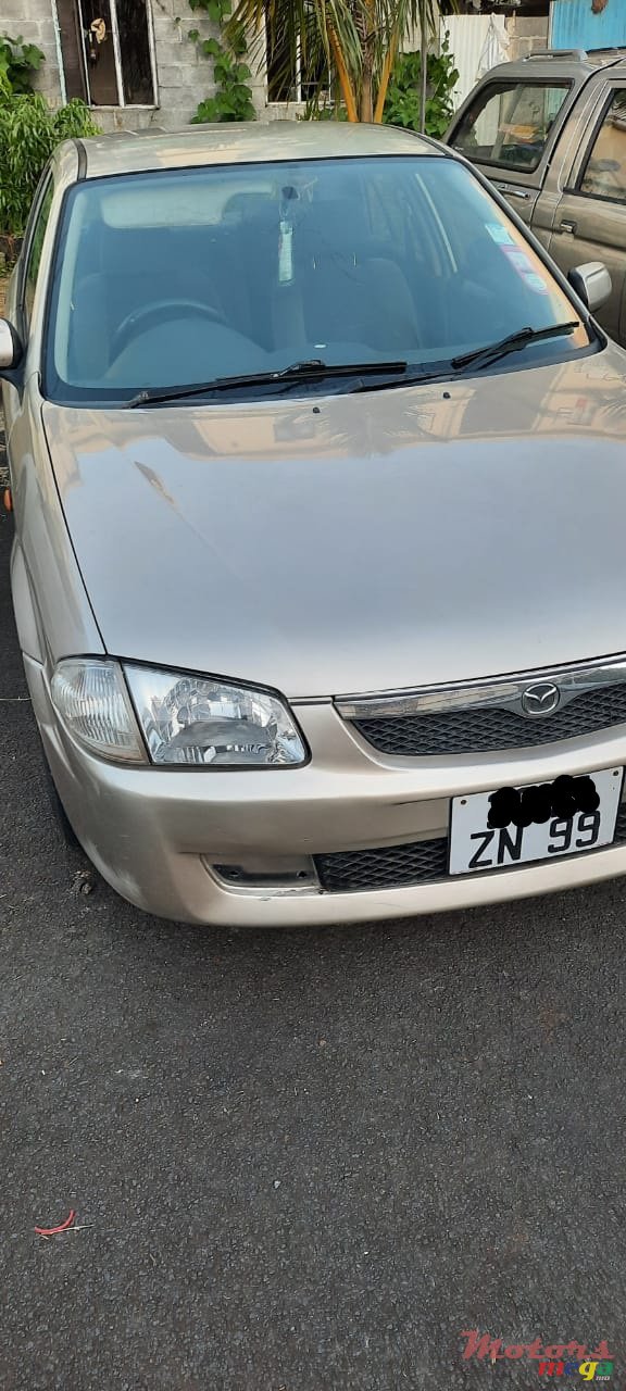 1999' Mazda 323 photo #2