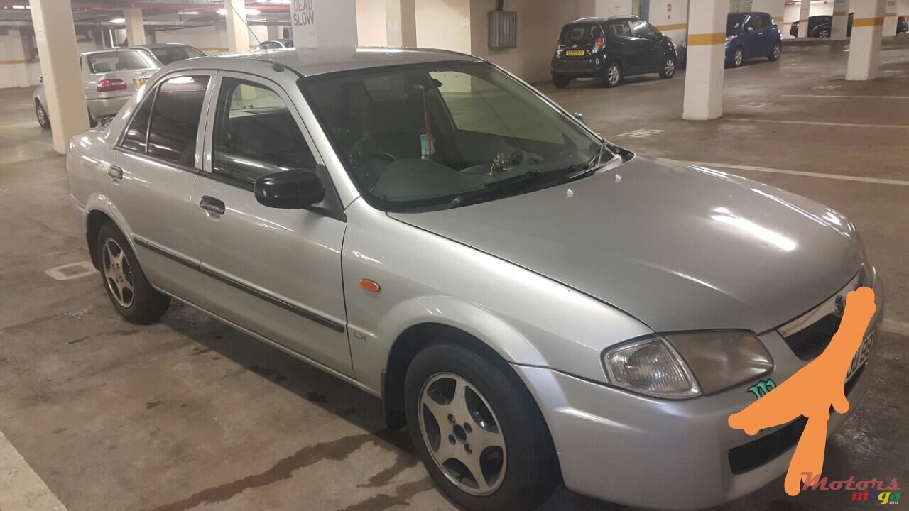 1999' Mazda 323 photo #1