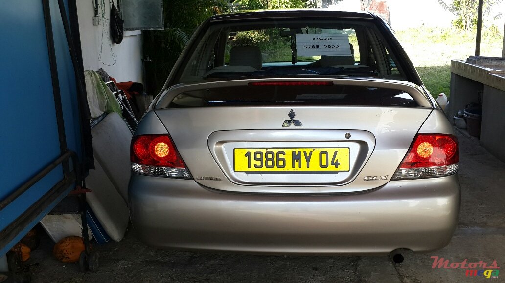 2004' Mitsubishi Lancer photo #4