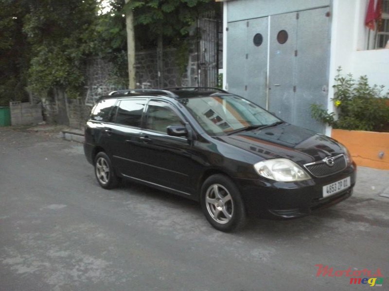 2001' Toyota Corolla jante cosmic+DVD photo #1