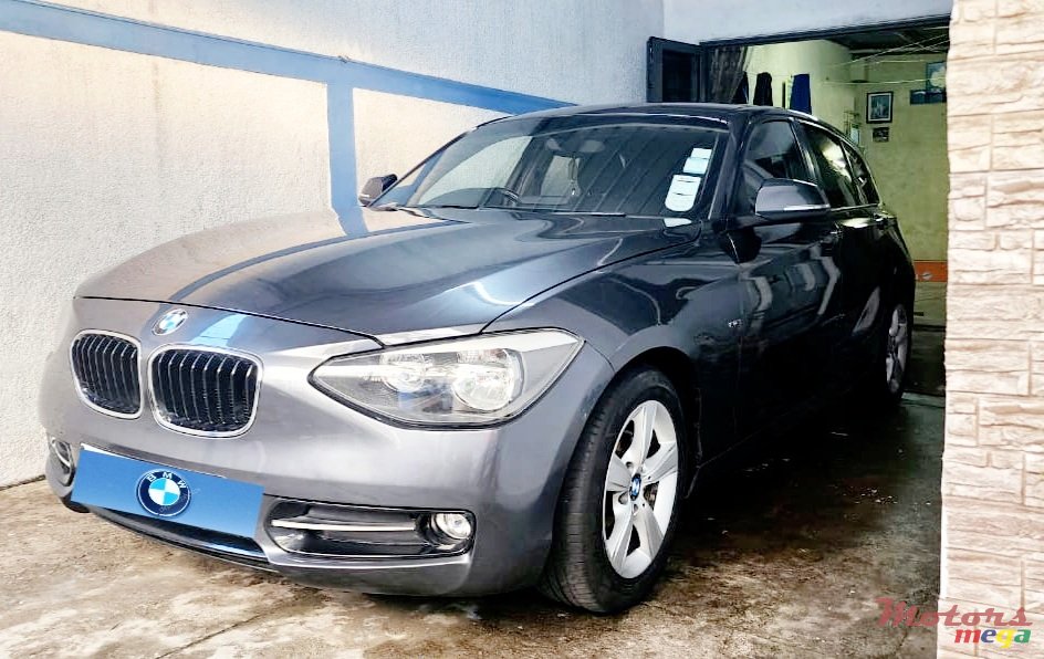 2011' BMW 116 photo #2