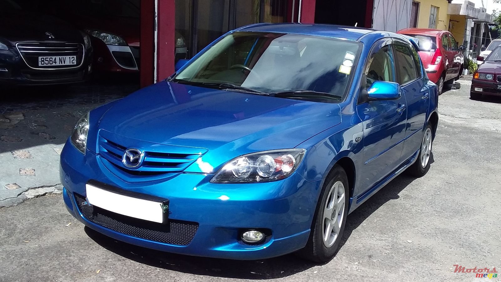 2005' Mazda 3 photo #1