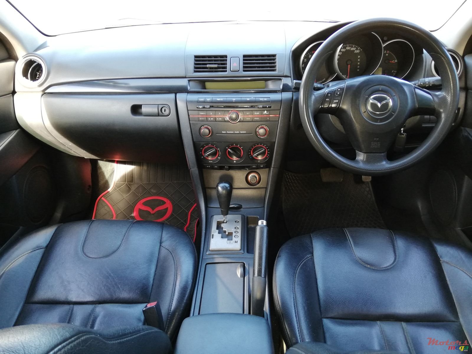 2004' Mazda 3 photo #1