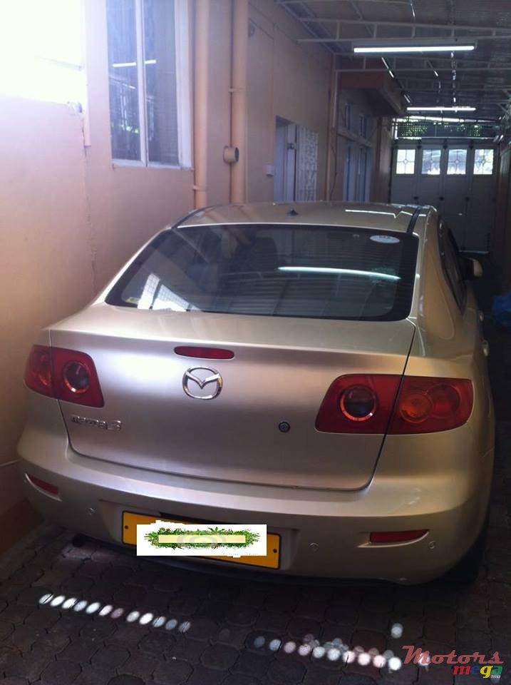 2004' Mazda 3 photo #5