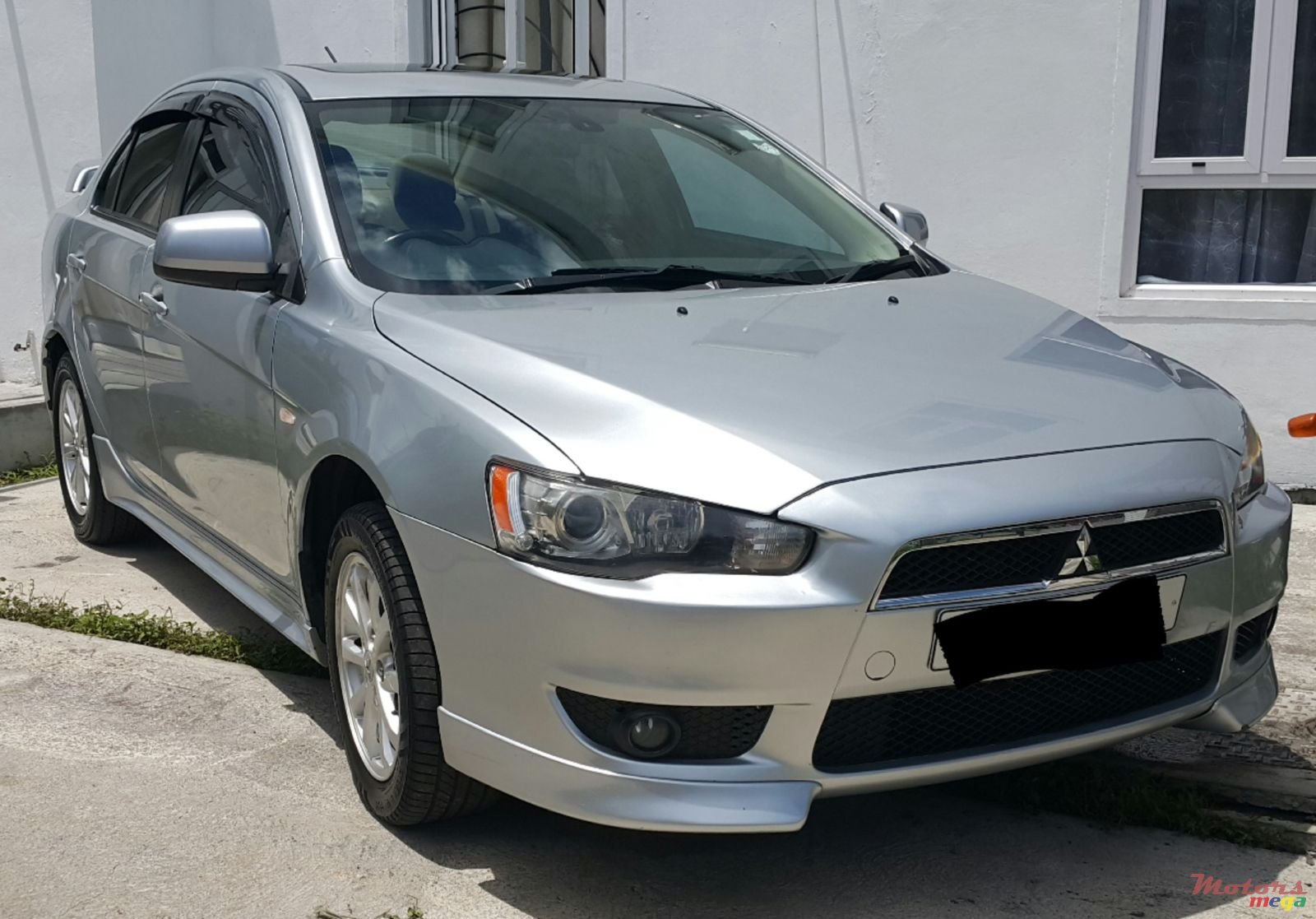 2011' Mitsubishi Lancer X Original photo #1