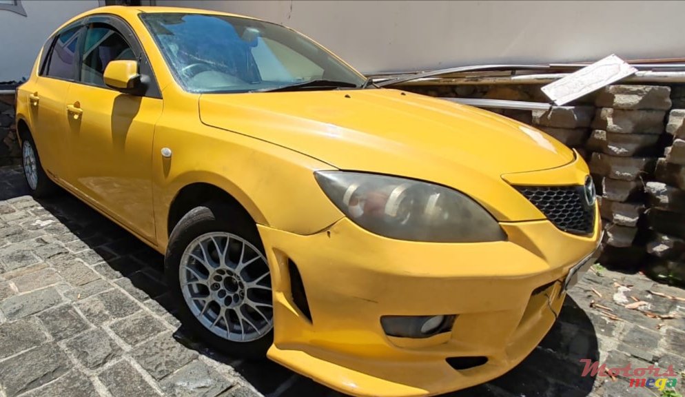 2004' Mazda 3 photo #4