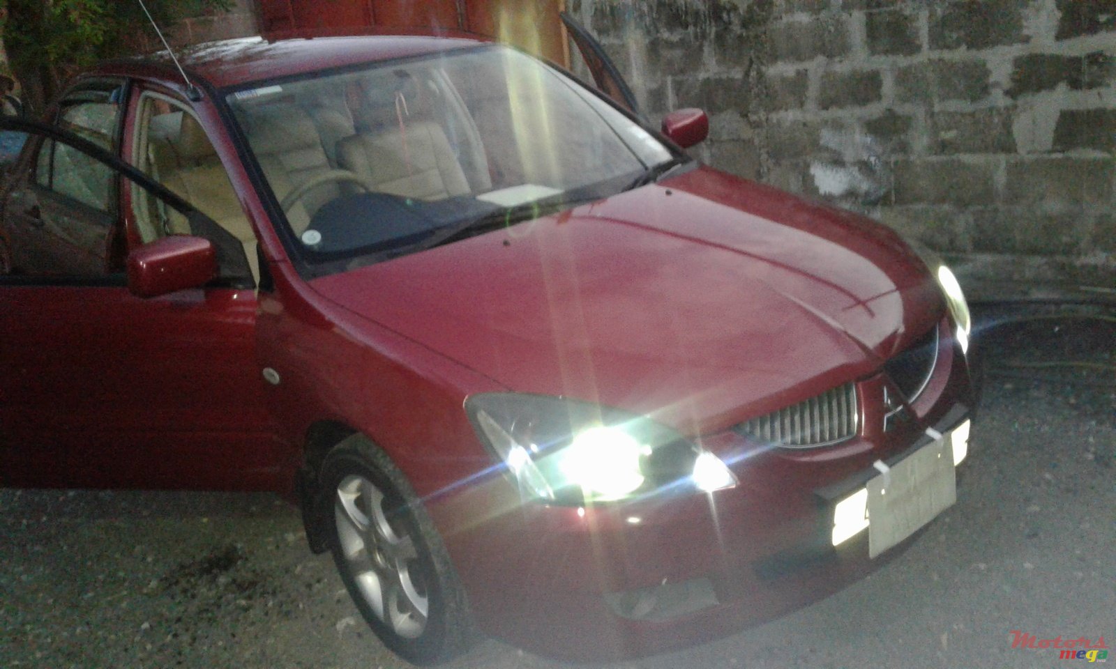 2004' Mitsubishi Lancer Glx photo #1