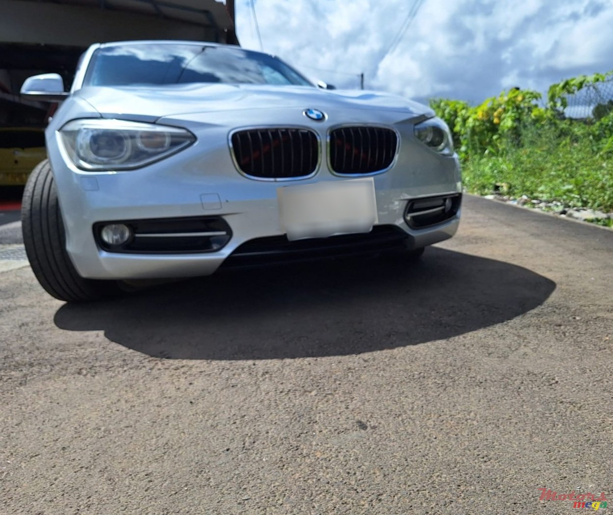 2012' BMW 116 F20 Sport photo #4