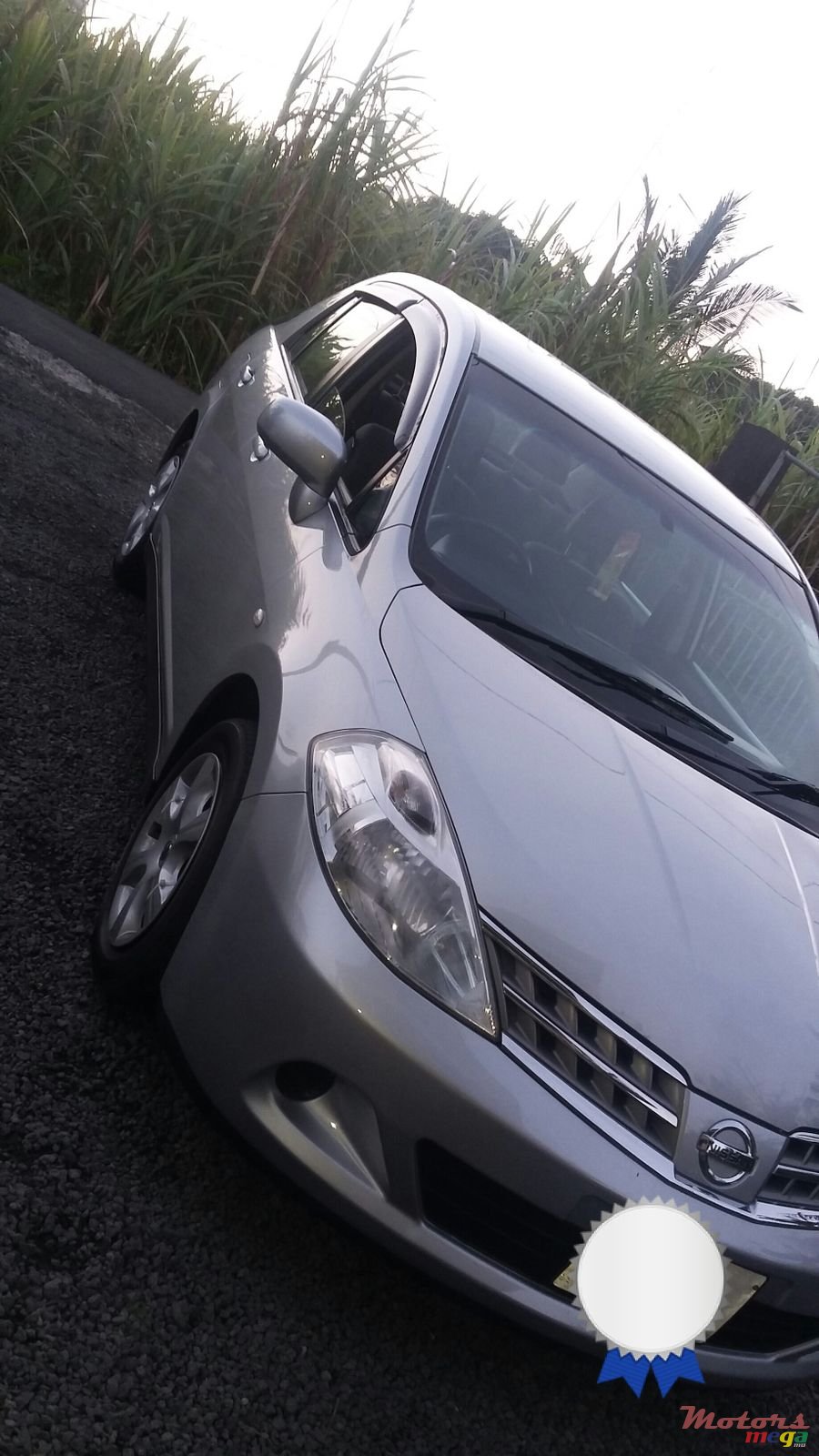 2010' Nissan Tiida photo #2