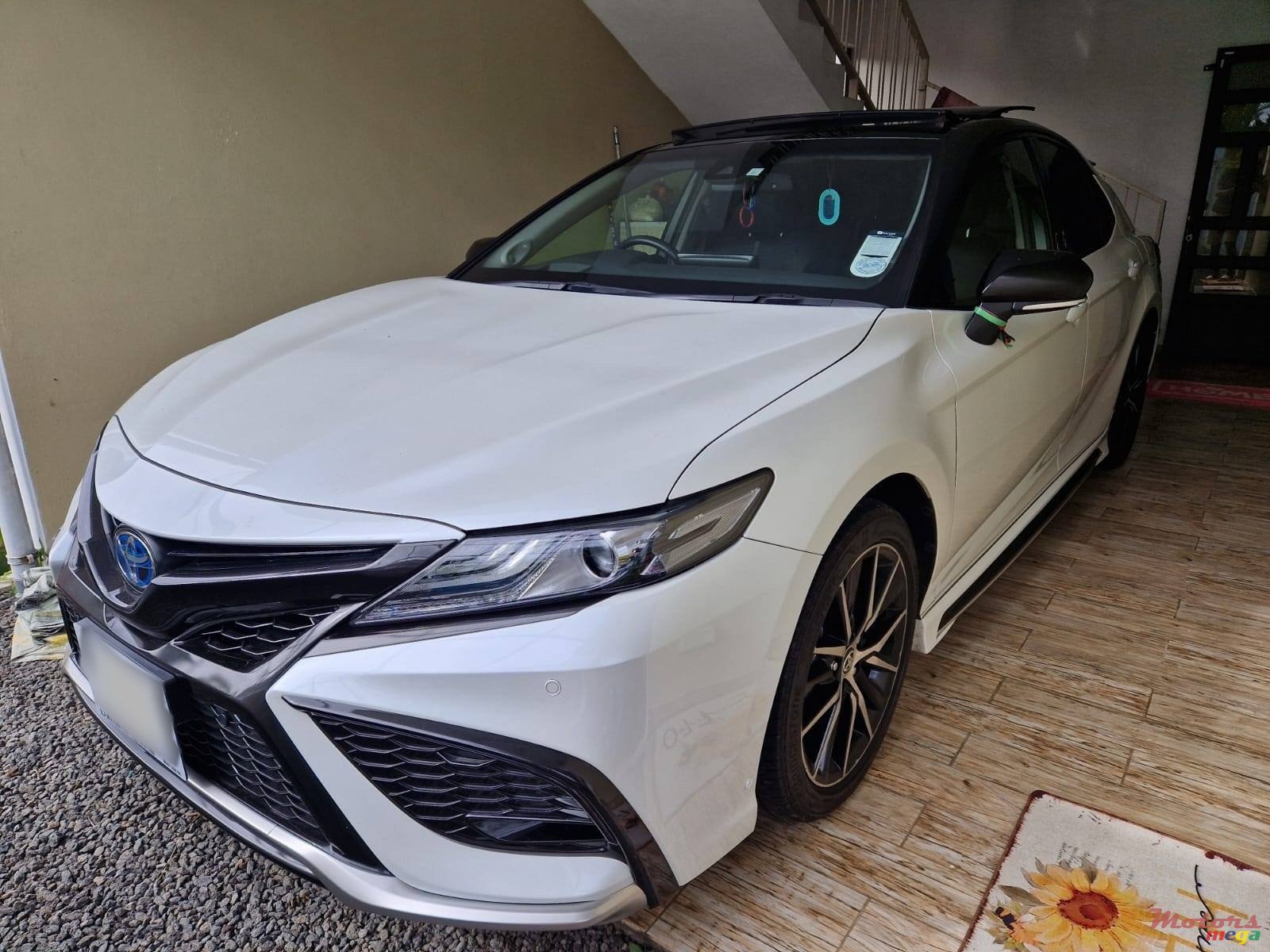 2023' Toyota Camry Hybrid photo #1