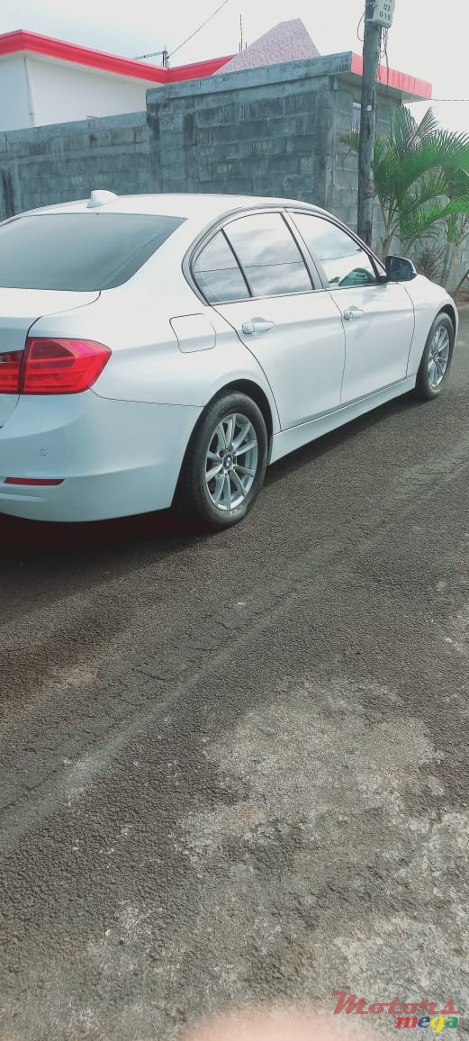 2013' BMW 116 photo #6