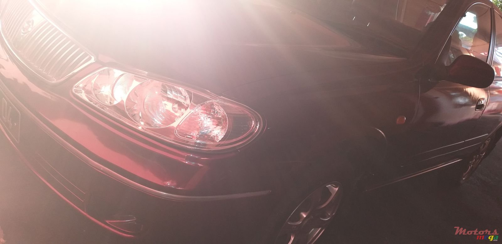 2004' Nissan Sunny photo #1