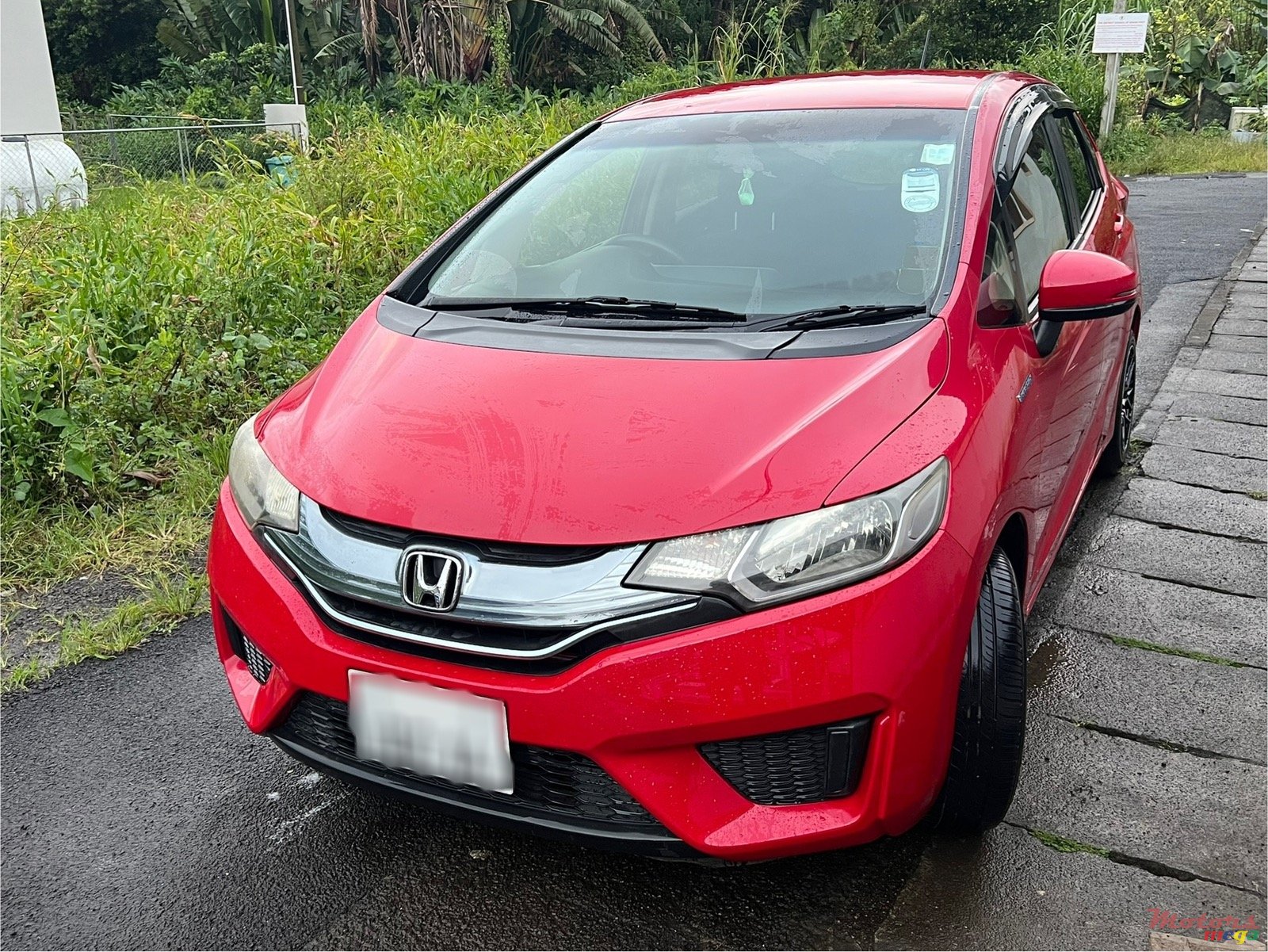 2014' Honda Fit Hybrid photo #1
