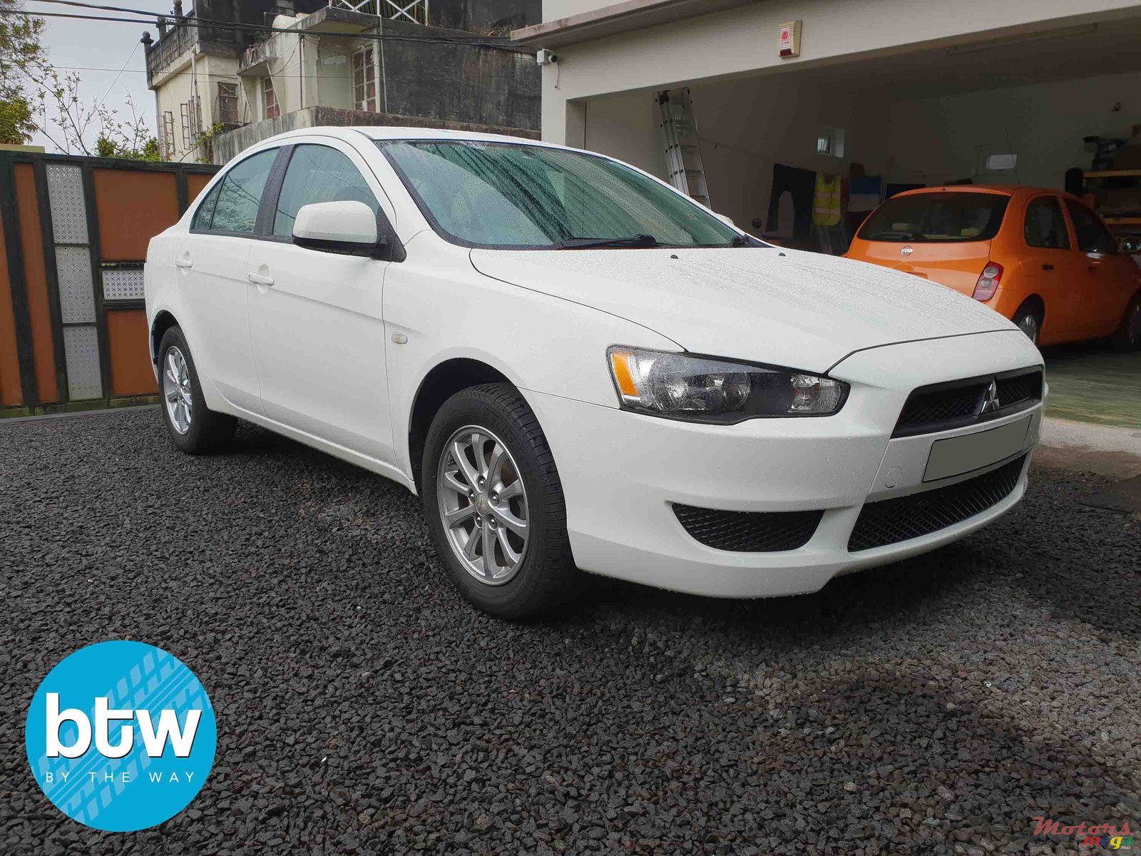 2016' Mitsubishi Lancer Ex photo #1