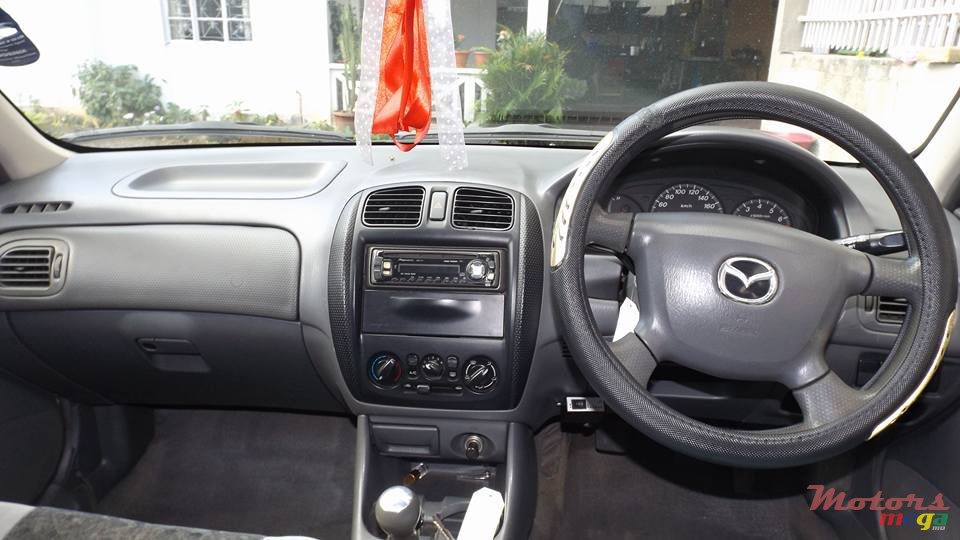 2000' Mazda 323 photo #6