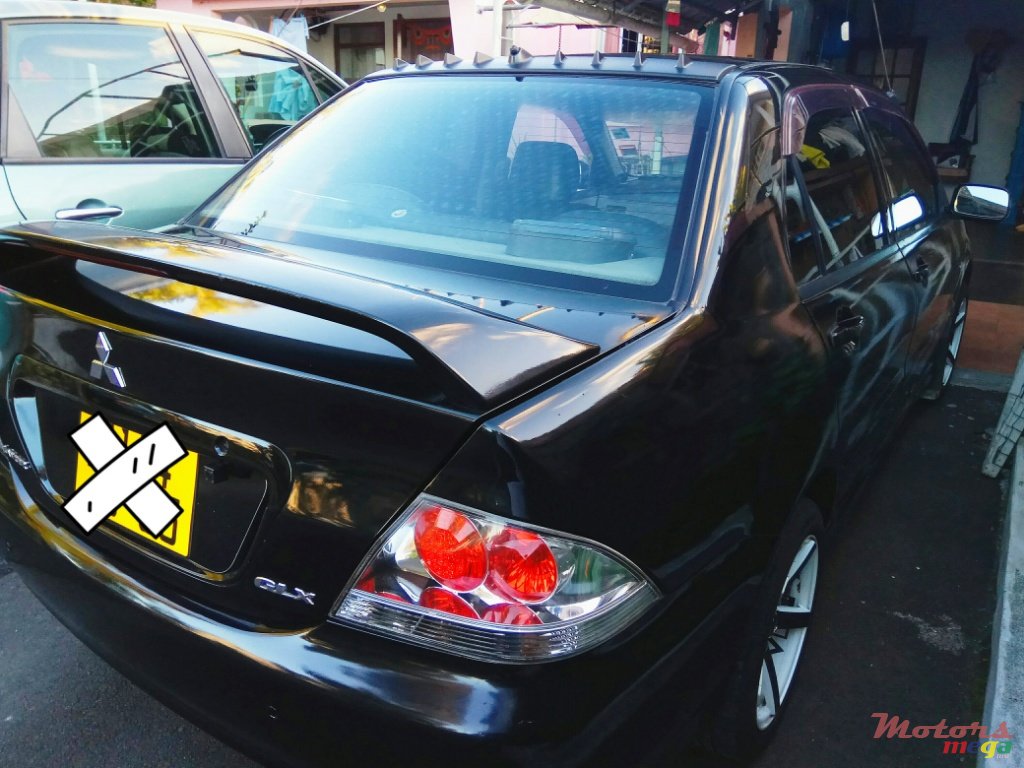 2003' Mitsubishi Lancer photo #2