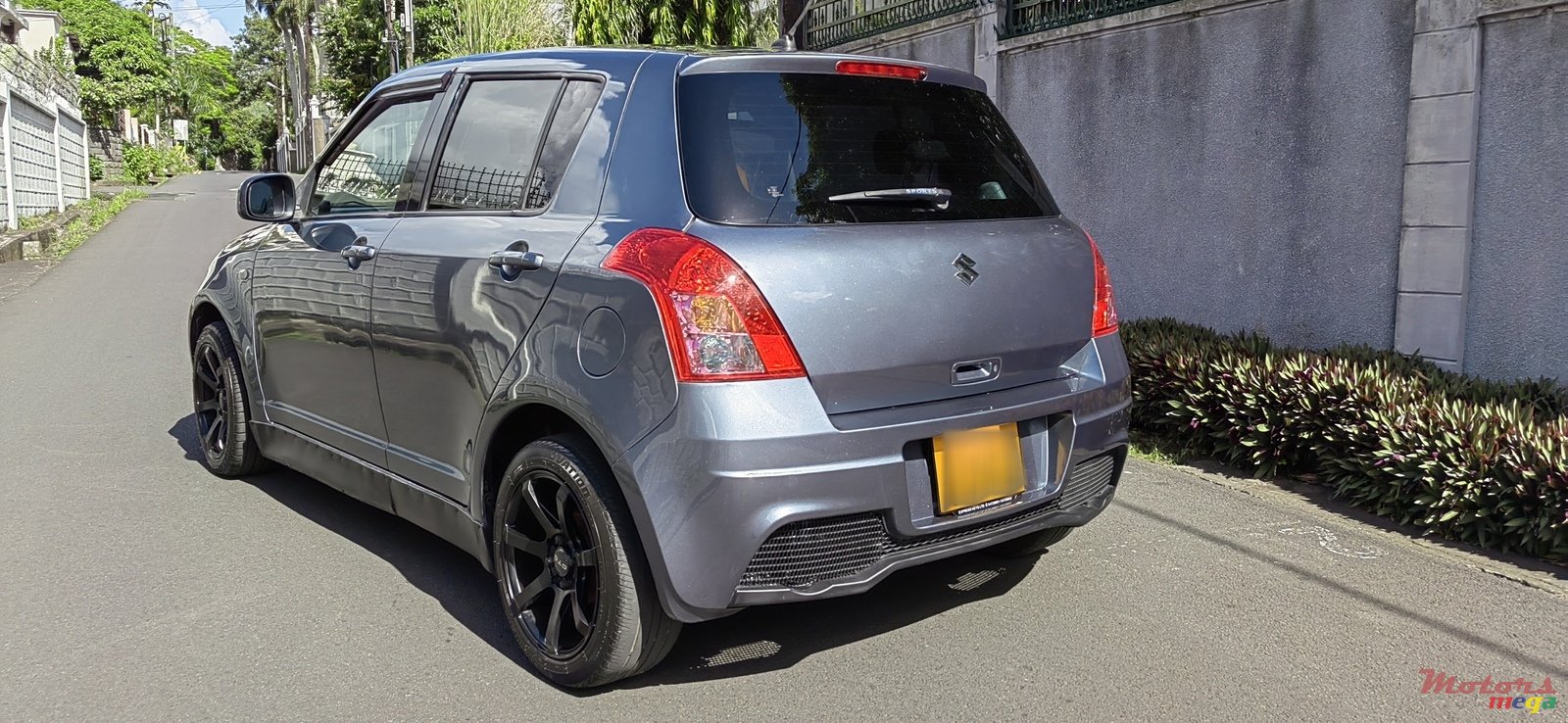 2009' Suzuki Swift photo #4