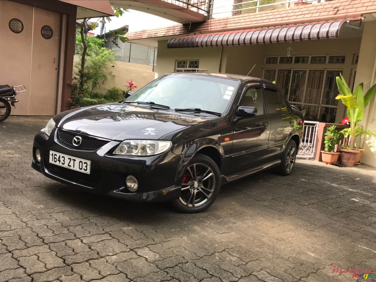 2003' Mazda Protege Origine sport 323 photo #2