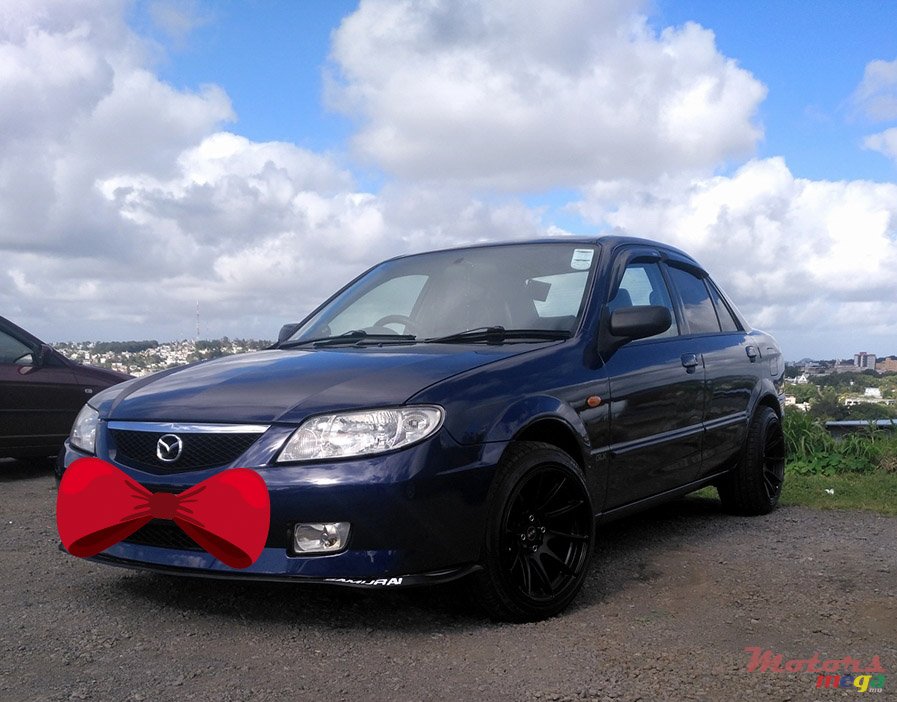 2002' Mazda 323 DELUXE photo #3