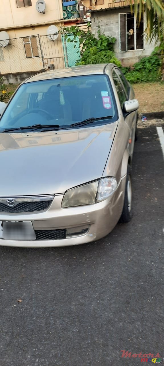 1999' Mazda 323 photo #2