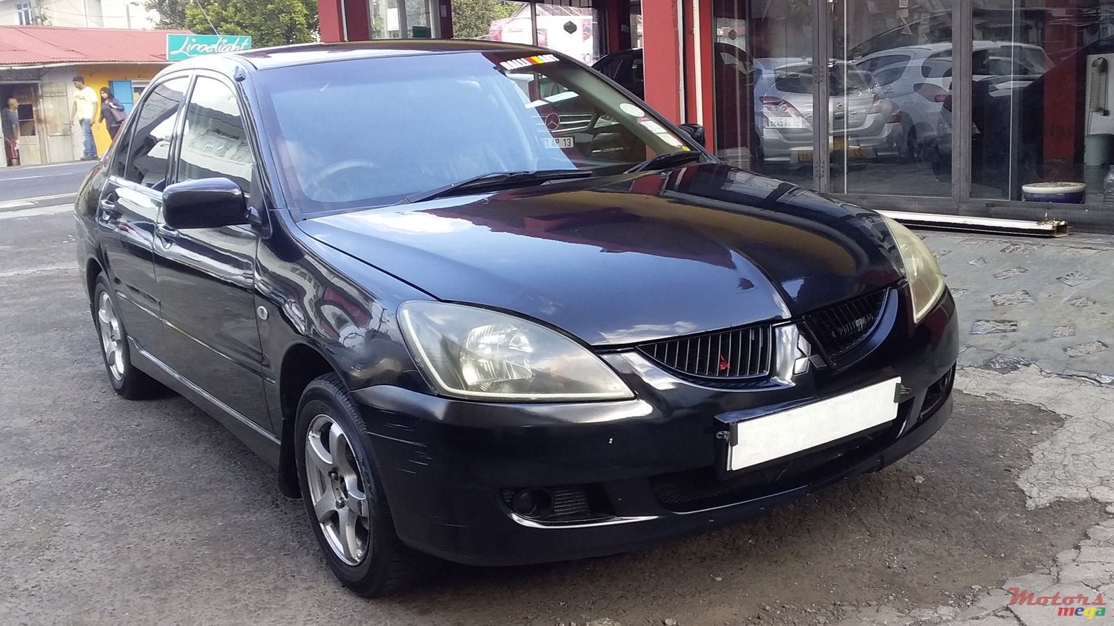 2004' Mitsubishi Lancer GLX photo #2