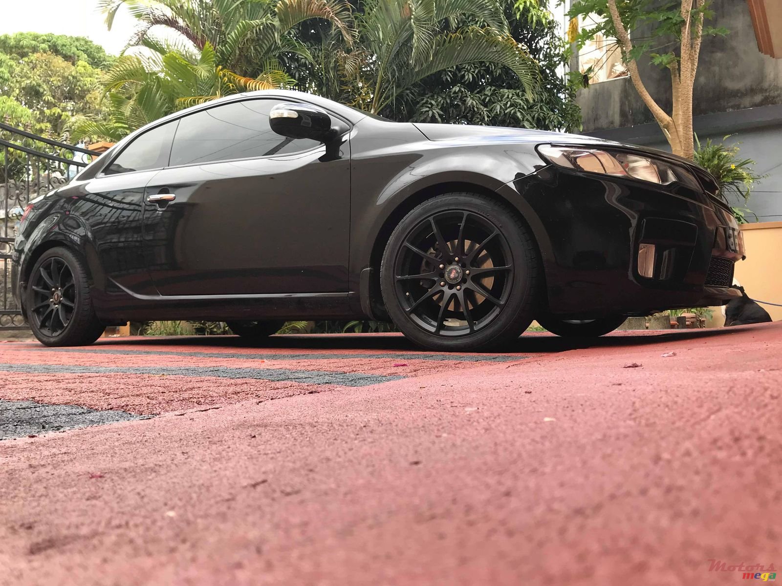 2010' Kia Koup Sport photo #6