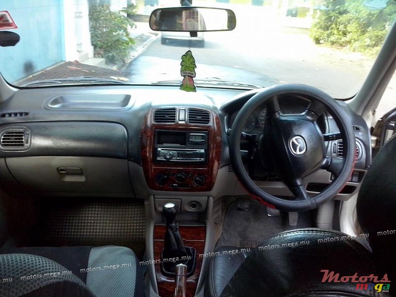 2002' Mazda 323 Japan photo #2