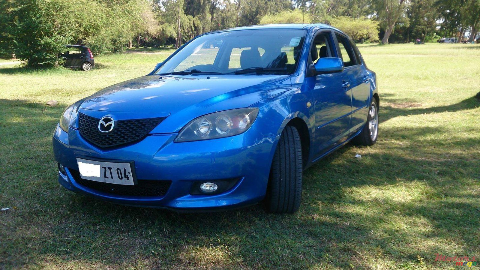 2004' Mazda 3 photo #2