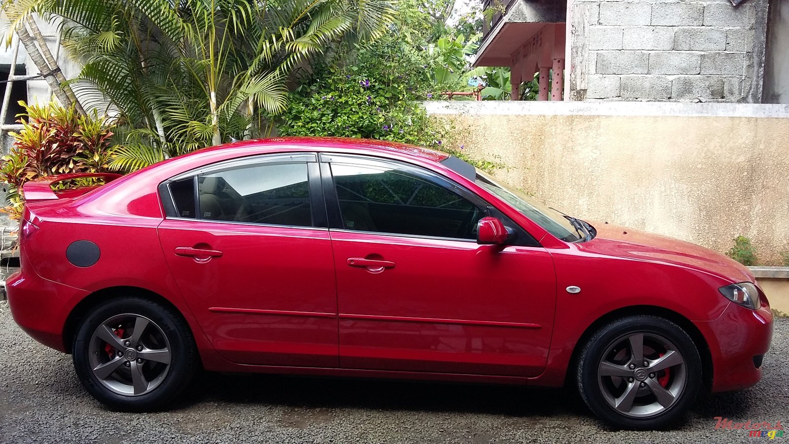 2004' Mazda 3 photo #1