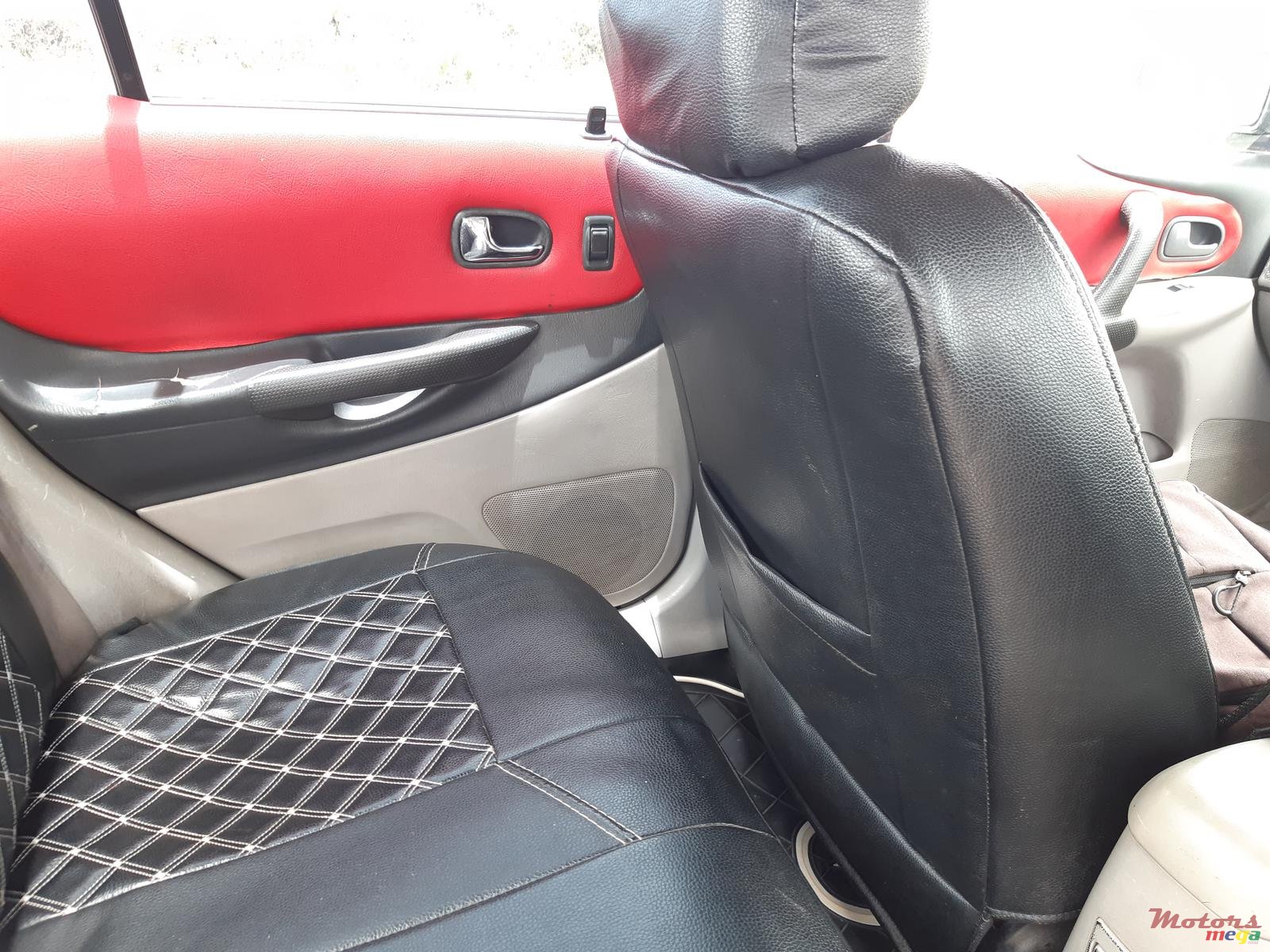 2002' Mazda 323 photo #6