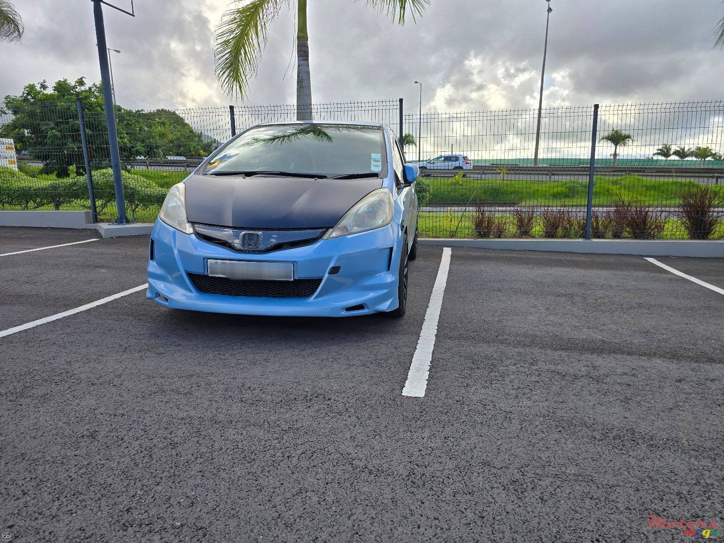 2012' Honda Fit Hybrid photo #1