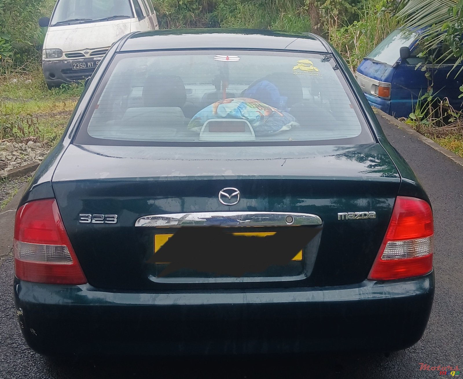 2000' Mazda 323 photo #2