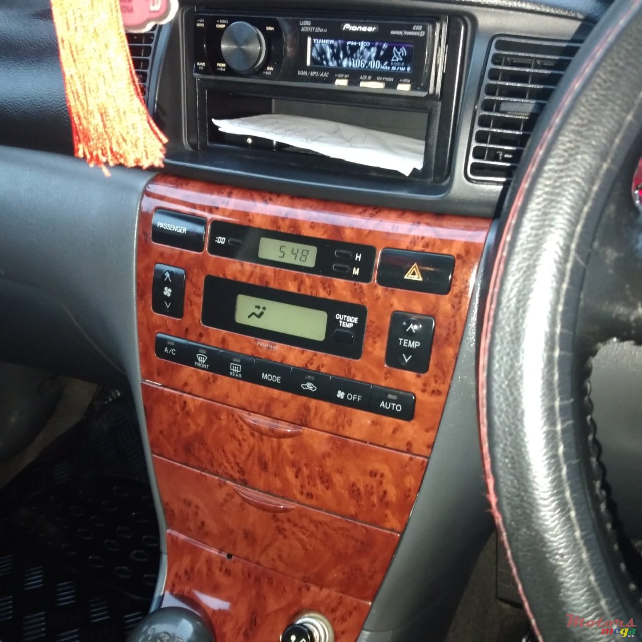 2004' Toyota Corolla NZE photo #3