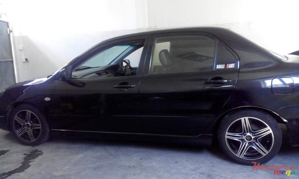 2004' Mitsubishi Lancer photo #1