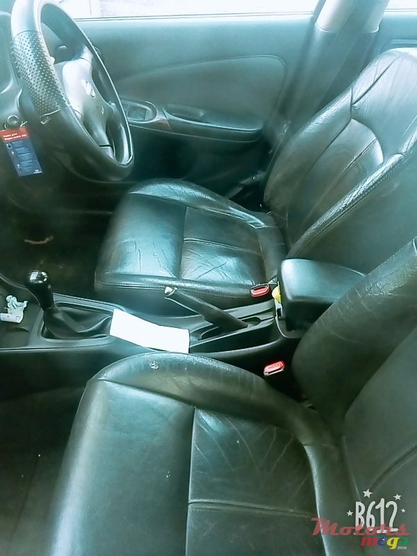 2004' Nissan Sunny photo #6