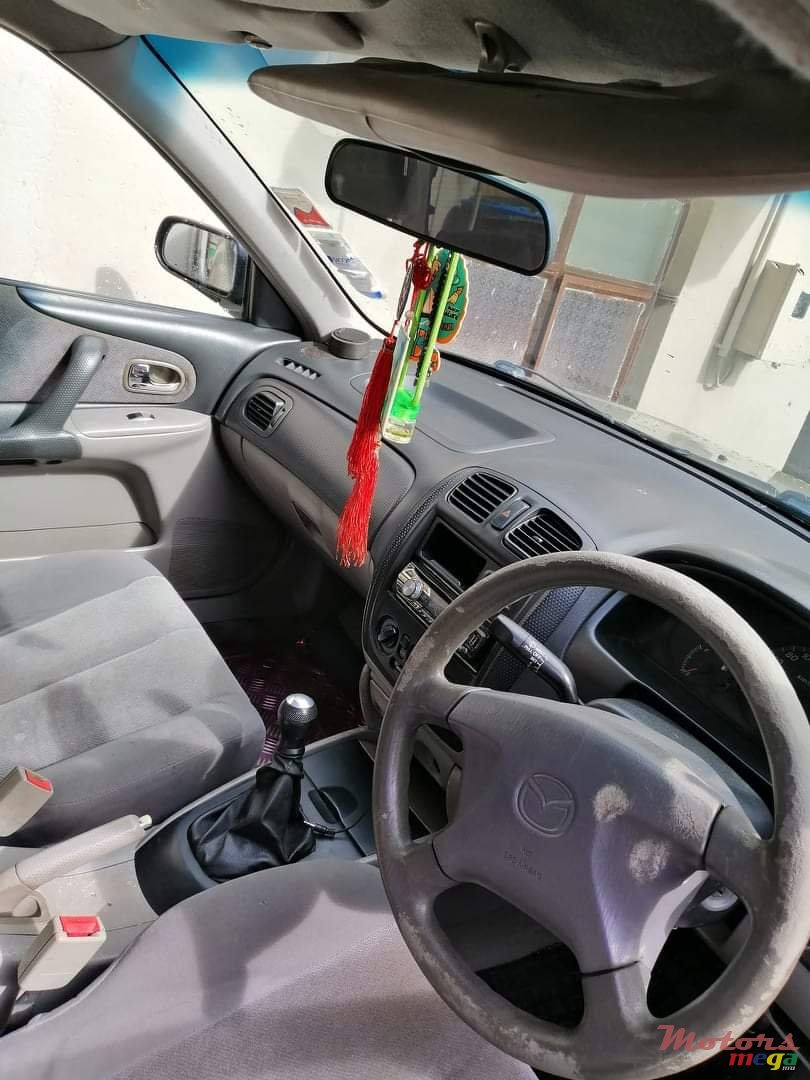 2002' Mazda 323 photo #4