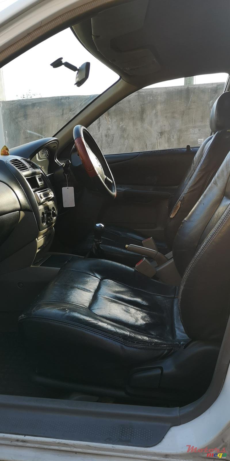 2002' Mazda 323 photo #4