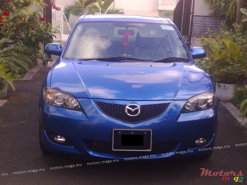 2004' Mazda 3 photo #1