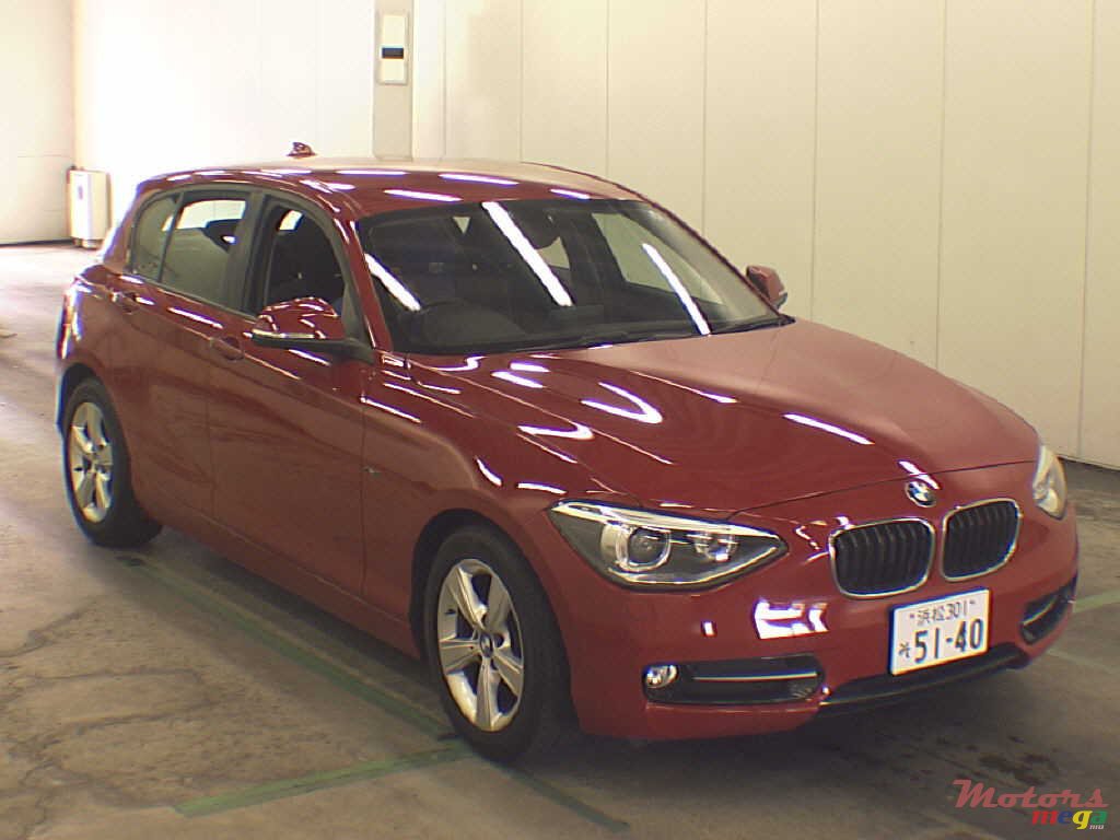 2011' BMW 116 Sports package photo #1