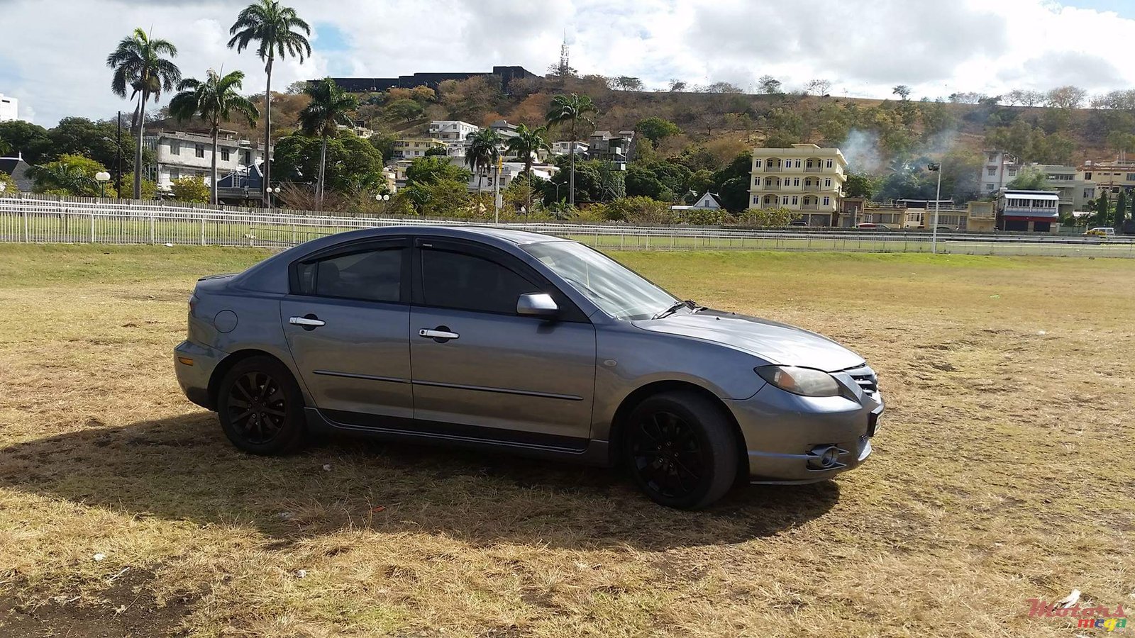 2004' Mazda 3 photo #1
