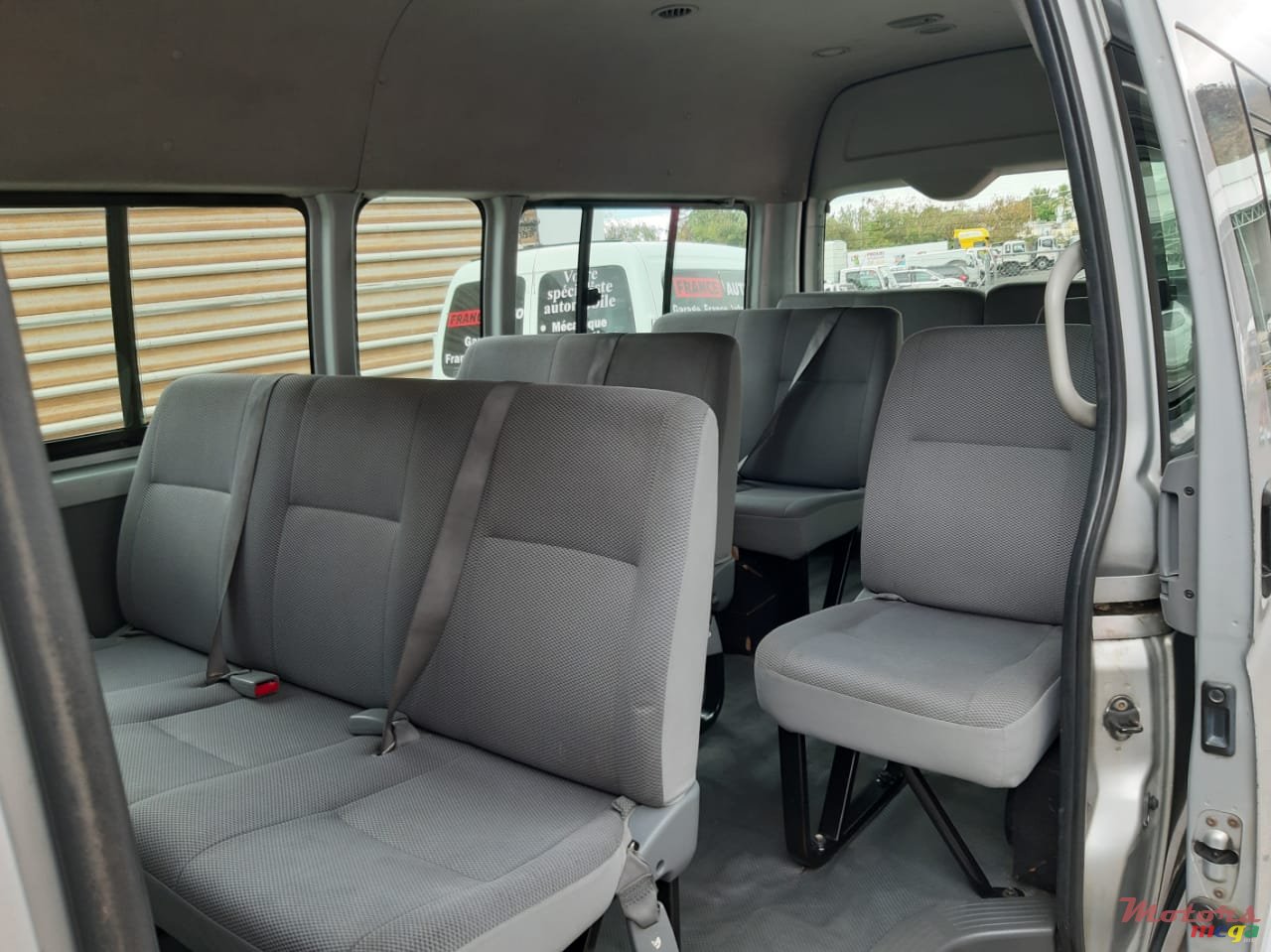 2009' Toyota HiAce Hiace High roof 16 seater photo #1